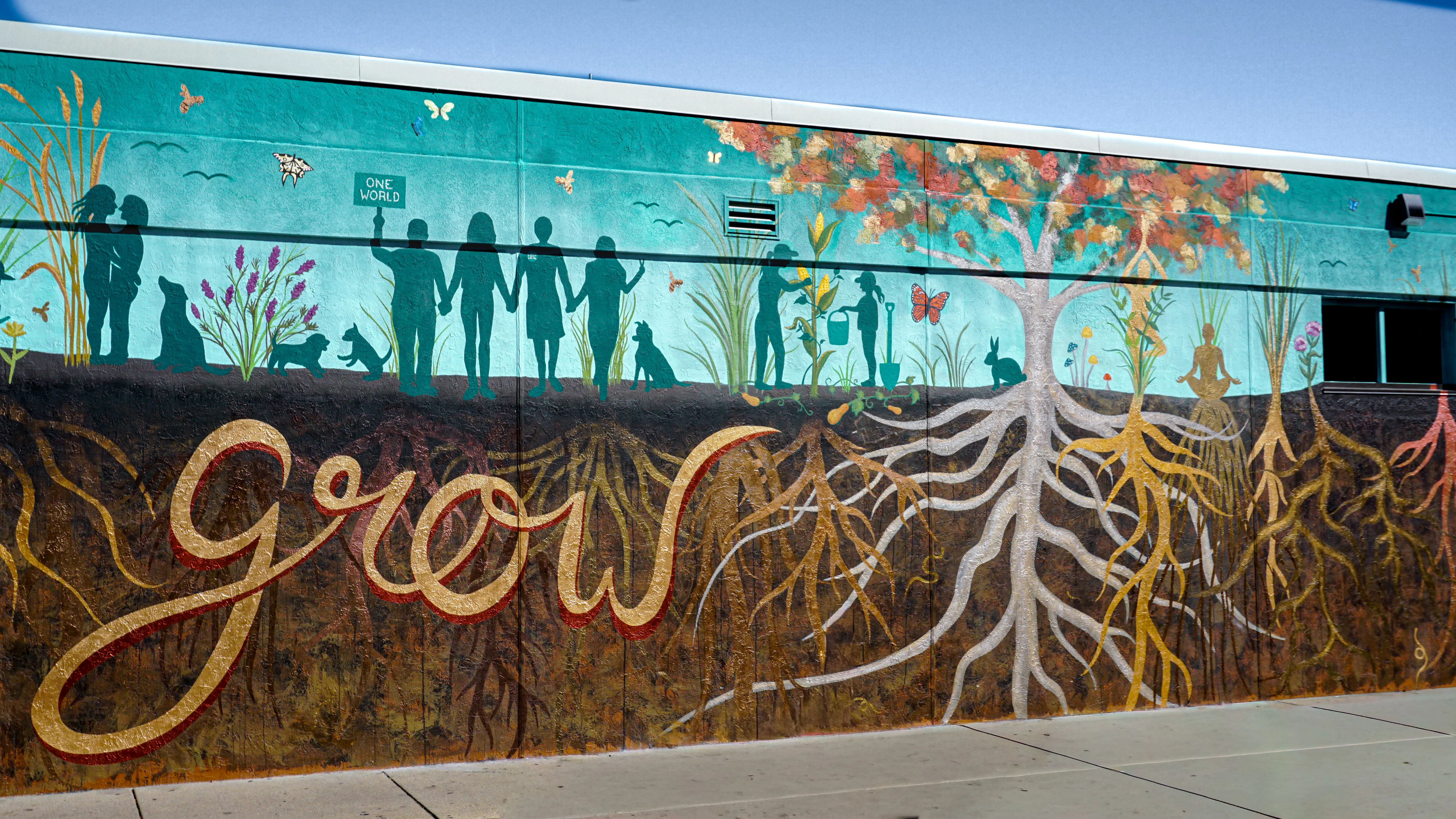 Process shot during the Roots community mural painting.