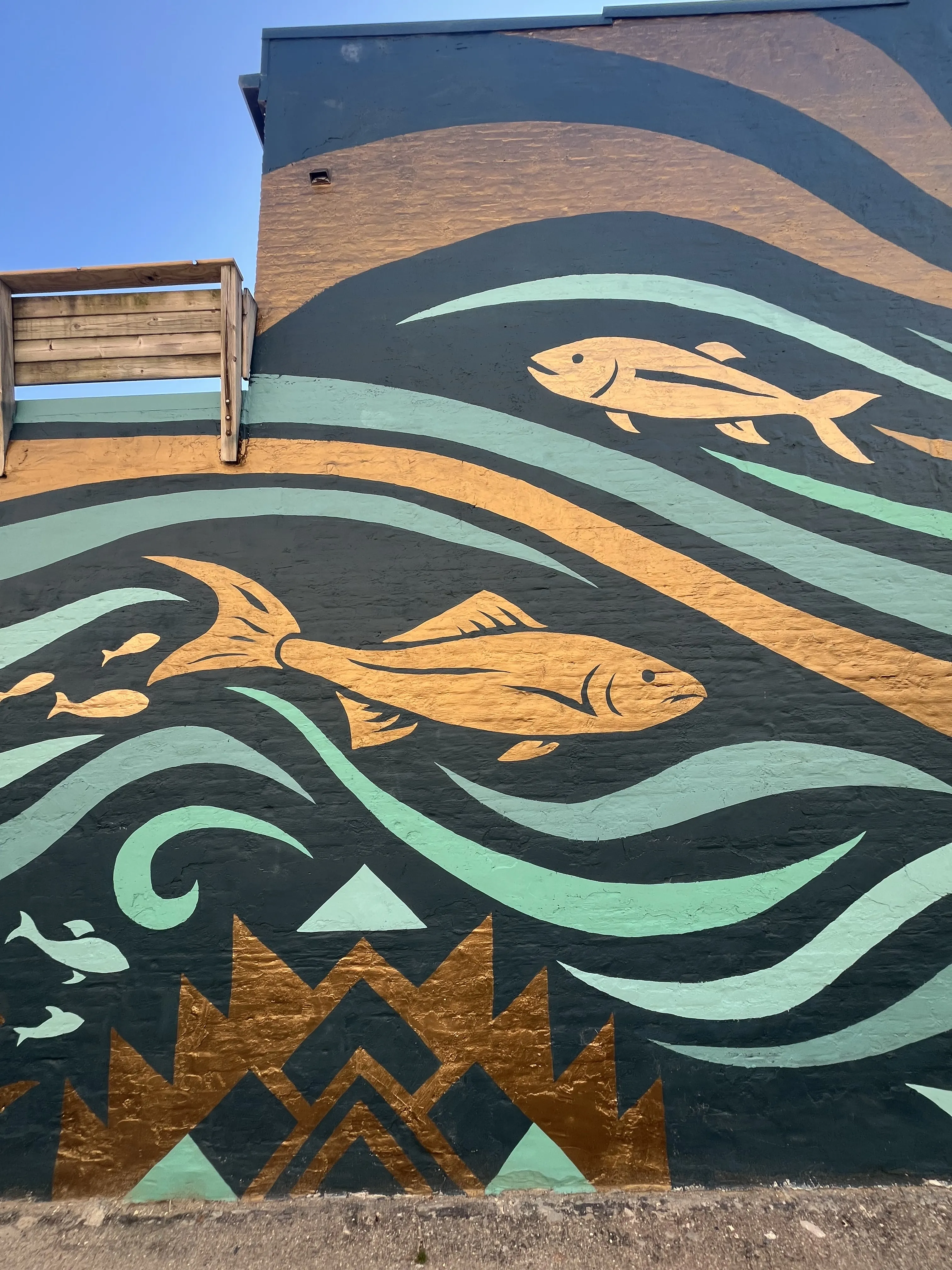Currents mural in context against the building.