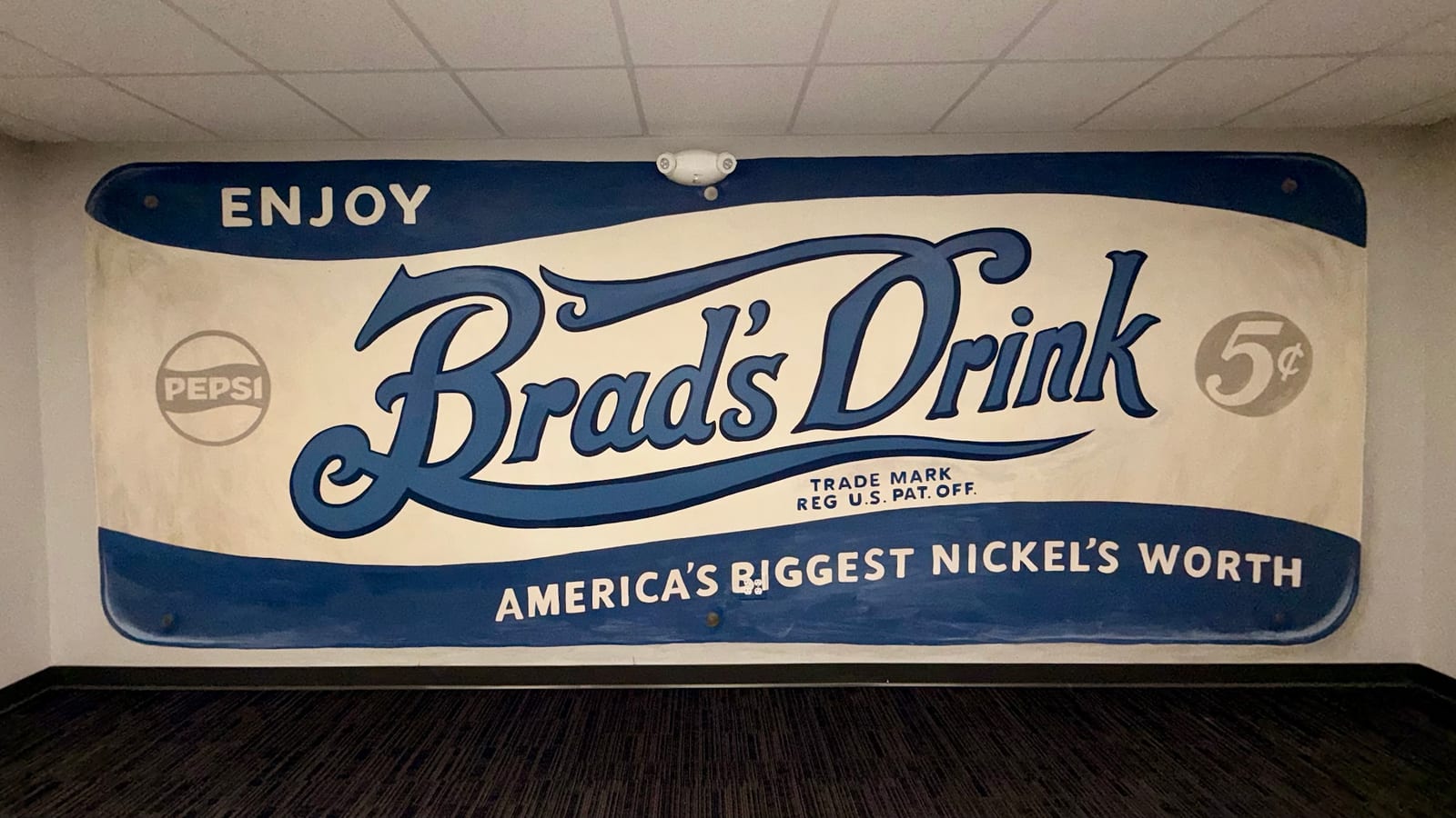 PepsiCo mural of the vintage Brad’s Drink sign, honoring the 1893 origin of Pepsi-Cola.